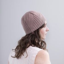 Beanie with wide ribbed texture that comes in at different angles in palm-size swatches.