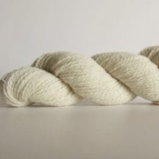 Undyed skein in off-white color.