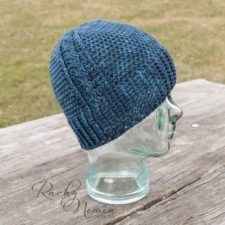 Crocheted beanie with vertical panel of contrasting texture