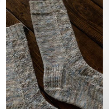 Socks with diamond texture down the front. Your guess is as good as mine.
