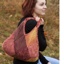 “Hobo” style bag with mitered squares in a monochromatic gradient. Squares are about 4.5 inches or 11.5 centimeters each.