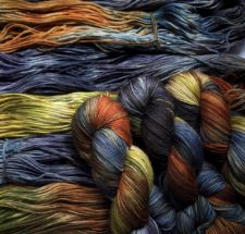 Variegated yarn in rich, warm colors.