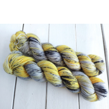 Black, yellow and gray variegated skeins.