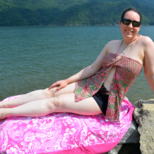 Designer wearing crochet bathingsuit coverup.