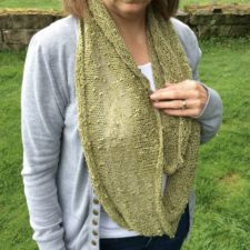 Simple, long cowl knit in slub yarn.