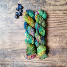 Highly variegated yarn in woodland colors.