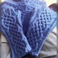 Five-strand cable on fingerless mitts.