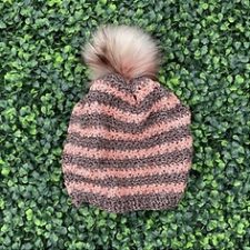 Striped beanie with pompom.