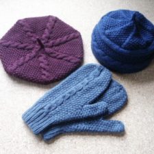 Cabled beret, cap and mittens.