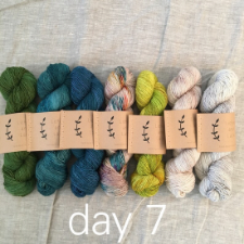 Full skein set that passes from green to aqua to cream and silver.