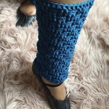 Crocheted legwarmers on model wearing ballet flats