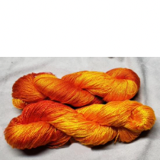 Tonal yarn in shades from deep orange to nearly yellow.