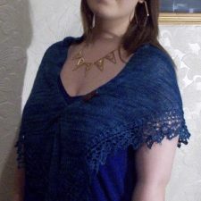 Simple shawlette with lace edge.