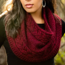 Wide and deep cowl with large braided cable at top and bottom, with texture in between.