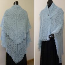 Very large square shawl, worn doubled as a triangle. Lots of delicate lace.