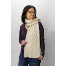 Wide scarf with overlapping vertical and angled textured lines.