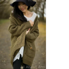 Long, bulky knitted cardigan with pockets.