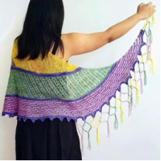 Oversize crescent shawl with large blocks in different colors and textures.