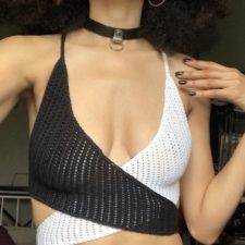 Two triangles in different colors that cross in front to create a crop top.
