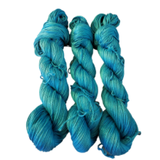 Velvety semisolid yarn in a medium blue-green