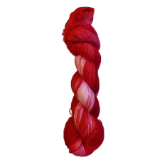 Deep red yarn with a bit of pinkish ice stirred in.
