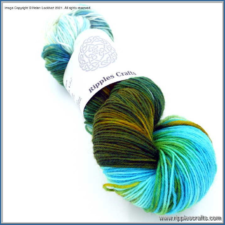 Variegated yarn that is part warm wood tones and part bright cool tones.