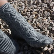 Cabled socks with sharp diamond pattern.
