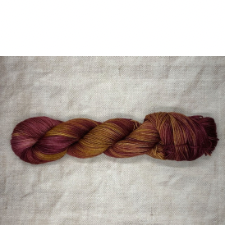 Gold and maroon variegated yarn.