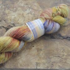Variegated yarn in muted tones.