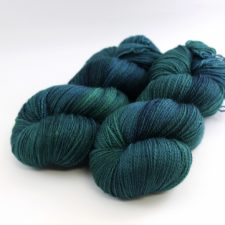Two skeins in cool, sea colors.