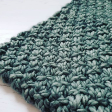 Chunky cowl in textured stitch pattern.