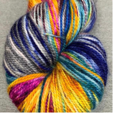 Bright variegated yarn in the colors of tropical flowers.