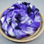 Variegated top in deep blue-purple and bright white.