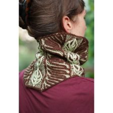 Brioche cowl with angular hems and leaf motifs.