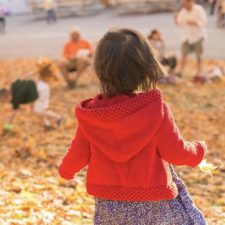 Cardigan with oversize hood on small child.