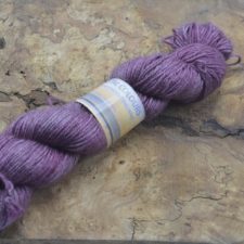 Tonal yarn in lavender color.