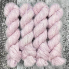 Palest pastel yarn with soft Suri halo.