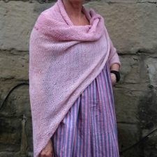 Simple triangular shawl in lightweight yarn.