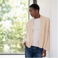 Simple, elegant cabled cardigan with no closures.