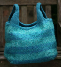 Felted striped tote with rounded handles for easy carrying.