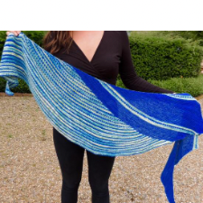 Crescent shawl in two colors, with overlapping crescents using short rows.