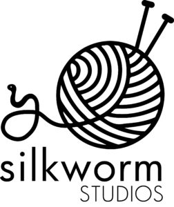 line drawing of a ball of yarn with two knitting needles sticking out of it and the words Silkworm Studios