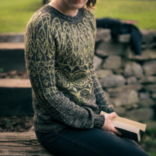 Long-sleeve pullover in two colors with colorwork reminiscent of Gothic windows throughout.
