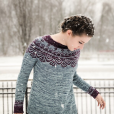 Long-sleeve pullover with colorwork in secondary color at the yoke and cuffs.