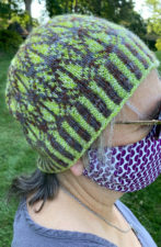 Colorwork hat with geometric pattern.