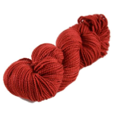 Semi-solid yarn skein in bright shade.