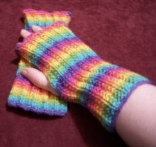 Rainbow striped ribbed fingerless mitts.