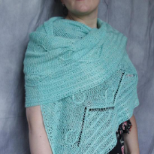 Fingering weight, drapey shawl with zigzag, horizontal and circular motifs