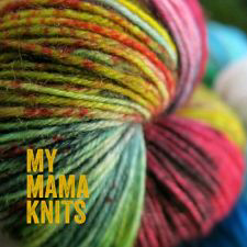 The words My Mama Knits are superimposed over a twisted skein of multicolor yarn