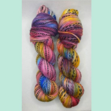 Beautiful secondary colors in variegated yarn on zebra base.